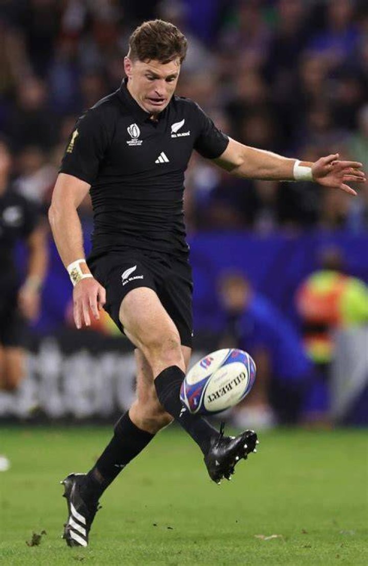 All Black Beauden Barrett falls on to his head in a sickening incident after a dangerous mid-air collision with Springbok Kurt-Lee Arendse in 2022.