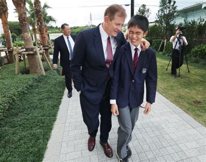 Elder Gary E. Stevenson walks with Masato Omine in Okinawa, Japan, on Friday, Nov. 10, 2023.